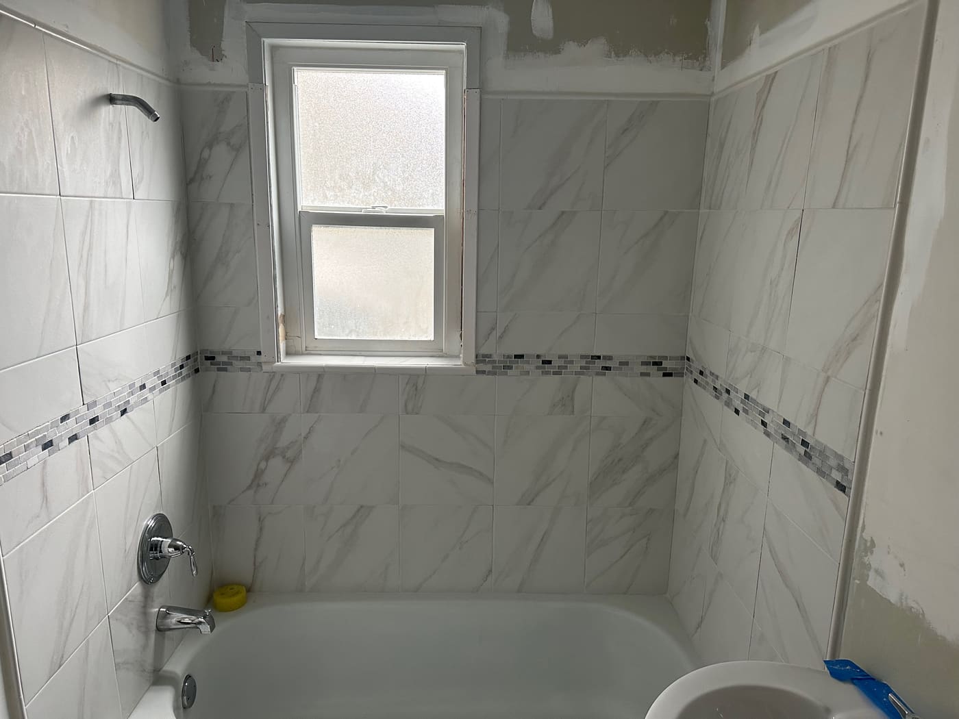 Tiled bathroom shower and tub surround